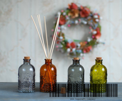 Glass bottle with cork and color sprayed.