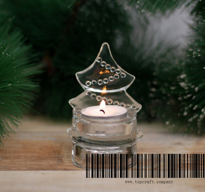 Glass chrismas tree candle holder.