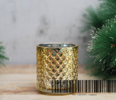 Glass candle cup with electroplate coating.