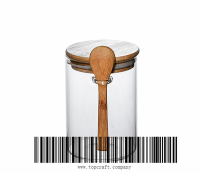 750ml borosilicate round glass storage jar with bamboo lid and spoon.
