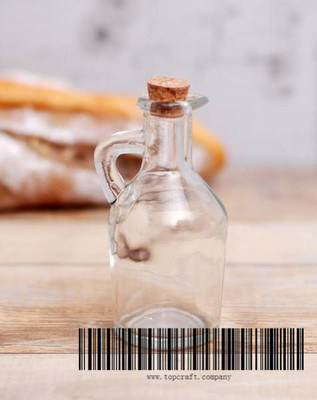 100ml glass bottle with cork.