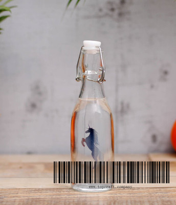 0.25 Ltr. Glass juice bottle with decal.